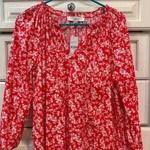 Red floral blouse